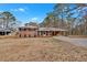 Beautifully maintained brick home with a metal roof and a convenient side garage at 4480 Highway 5, Douglasville, GA 30135