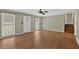 Bright living room with hardwood floors, large windows, and a cozy atmosphere at 4480 Highway 5, Douglasville, GA 30135