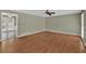 Open living room with wood floors, neutral paint, and natural light at 4480 Highway 5, Douglasville, GA 30135