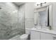 Bathroom with glass shower enclosure and tiled wall at 105 City View Ne Ct, Atlanta, GA 30308