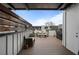 A view of a deck with wood-like floor and a seating area under the open sky at 105 City View Ne Ct, Atlanta, GA 30308