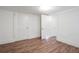 Bright bedroom featuring pristine white walls and light hardwood flooring at 1181 Fairview Ne Rd, Atlanta, GA 30306