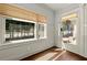 Sun-drenched entryway with hardwood floors, bright windows, and custom window shades at 1181 Fairview Ne Rd, Atlanta, GA 30306