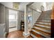 Hallway features staircase, bathroom, and view into other rooms at 1181 Fairview Ne Rd, Atlanta, GA 30306