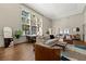 Sun-filled living room with hardwood floors, lots of windows, fireplace, and plenty of space at 1181 Fairview Ne Rd, Atlanta, GA 30306