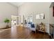 Well-lit living room with hardwood floors, glass doors and a cozy seating area at 1181 Fairview Ne Rd, Atlanta, GA 30306