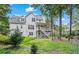 Backyard with a multi-level deck provides a great view of the surrounding mature landscaping at 1274 Creek Laurel Dr, Lawrenceville, GA 30043