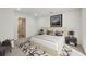 Spacious bedroom with modern decor, plush carpet, and neutral color palette at 24308 Plantation Ne Dr, Atlanta, GA 30324