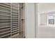 Bright, organized walk-in closet with shelving units, providing ample storage and organization within the home at 24308 Plantation Ne Dr, Atlanta, GA 30324