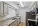 Kitchen featuring stainless steel appliances and granite countertops at 24308 Plantation Ne Dr, Atlanta, GA 30324