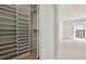 Spacious walk-in closet with custom shelving, leading to the bedroom at 24308 Plantation Ne Dr, Atlanta, GA 30324