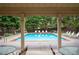 View of the pool with chairs and tables. An outdoor space for relaxation and enjoyment at 235 Rippling Nw Dr, Marietta, GA 30064