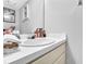 Bright bathroom vanity with a white sink, ample counter space, and stacked white towels at 3135 Nectar Dr, Powder Springs, GA 30127