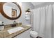 Bathroom featuring a granite countertop vanity and a shower with a white curtain at 3135 Nectar Dr, Powder Springs, GA 30127