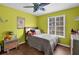 Bedroom with a bed, bedside tables, and a window at 3135 Nectar Dr, Powder Springs, GA 30127