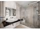 Modern bathroom showcasing a glass-enclosed shower, sleek vanity, and contemporary tile work at 437 Hollydale Nw Ct, Atlanta, GA 30342