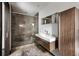 Modern bathroom featuring glass shower, floating vanity, and sleek design at 437 Hollydale Nw Ct, Atlanta, GA 30342