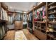 Spacious walk-in closet with custom shelving, ample storage, and wood flooring at 437 Hollydale Nw Ct, Atlanta, GA 30342