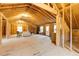 Unfinished attic with exposed wood framing, furniture and christmas decorations at 5322 Seaton Dr, Dunwoody, GA 30338