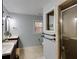 Well-lit bathroom with double vanities and a walk-in shower at 5322 Seaton Dr, Dunwoody, GA 30338