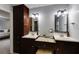 Bathroom featuring double sinks with new fixtures and custom cabinetry at 5322 Seaton Dr, Dunwoody, GA 30338