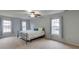 Bright bedroom with neutral carpet and a large window at 5322 Seaton Dr, Dunwoody, GA 30338