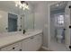 Bathroom with white cabinets, white counters, and tiled floors at 2001 Towne Lake W Hls, Woodstock, GA 30189