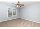 Bedroom with a ceiling fan and a window at 2001 Towne Lake W Hls, Woodstock, GA 30189