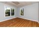 Bonus room featuring wood-look floors and natural light at 2001 Towne Lake W Hls, Woodstock, GA 30189