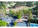 Beautiful aerial view showcasing community amenities including a playground, tennis court, and clubhouse at 2001 Towne Lake W Hls, Woodstock, GA 30189