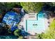Aerial view of community pool with slide and lounge area at 2001 Towne Lake W Hls, Woodstock, GA 30189