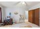 Bedroom with neutral walls, wood trim, and neutral carpet at 607 Cascade Sw Dr, Lilburn, GA 30047