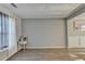 Modern living room with hardwood floors and bright natural light at 1171 Pine Acre Dr, Sugar Hill, GA 30518