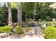 Landscaped backyard with stone steps at 3448 Paces Ferry Cir, Smyrna, GA 30080