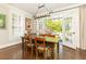 Inviting dining room with natural light and French doors to the backyard at 3448 Paces Ferry Cir, Smyrna, GA 30080