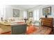 Inviting living room with neutral colors, soft natural light, and an area rug that adds character to the room's decor at 3448 Paces Ferry Cir, Smyrna, GA 30080