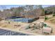 This image shows a community playground, picnic tables, and tennis courts for recreation and socializing at 4325 Cody Ct, Cumming, GA 30040