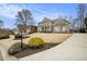 This is a charming two-story home with a well-kept lawn and a classic mailbox at 4325 Cody Ct, Cumming, GA 30040