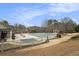 An overhead view of a large, covered community pool with multiple seating areas at 4325 Cody Ct, Cumming, GA 30040