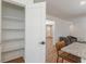 Charming butler's pantry with classic white shelving near kitchen and granite countertop breakfast bar at 442 Mountain Park Trl, Stone Mountain, GA 30087