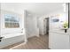 Bright bathroom with tub, shower, and vanity area with natural light at 900 Melrose Park Pl, Lawrenceville, GA 30044