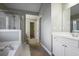 Primary bath featuring white cabinets, neutral paint, and separate tub and shower at 1278 Crown Ter, Marietta, GA 30062