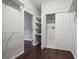 Organized walk-in closet featuring built-in shelving and storage, and access to second closet at 1278 Crown Ter, Marietta, GA 30062