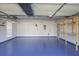 Spacious garage with clean, epoxy floors, shelving, and an automatic door opener at 1278 Crown Ter, Marietta, GA 30062