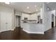 Bright kitchen featuring white cabinets, granite countertops, and stainless steel appliances at 1278 Crown Ter, Marietta, GA 30062