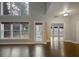 Spacious living room with hardwood floors, a back patio, and ample natural light at 1278 Crown Ter, Marietta, GA 30062