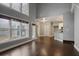 Bright living room with hardwood floors, lots of natural light, and a view into the kitchen at 1278 Crown Ter, Marietta, GA 30062