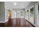 Bright sunroom with hardwood floors and multiple windows offering natural light and backyard views at 1278 Crown Ter, Marietta, GA 30062