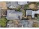 Aerial view of home with manicured backyard, patio and detached garage at 239 E Wesley Ne Rd, Atlanta, GA 30305