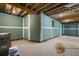 Unfinished basement with exposed ceiling, framed walls, and concrete floor ready for customization at 239 E Wesley Ne Rd, Atlanta, GA 30305